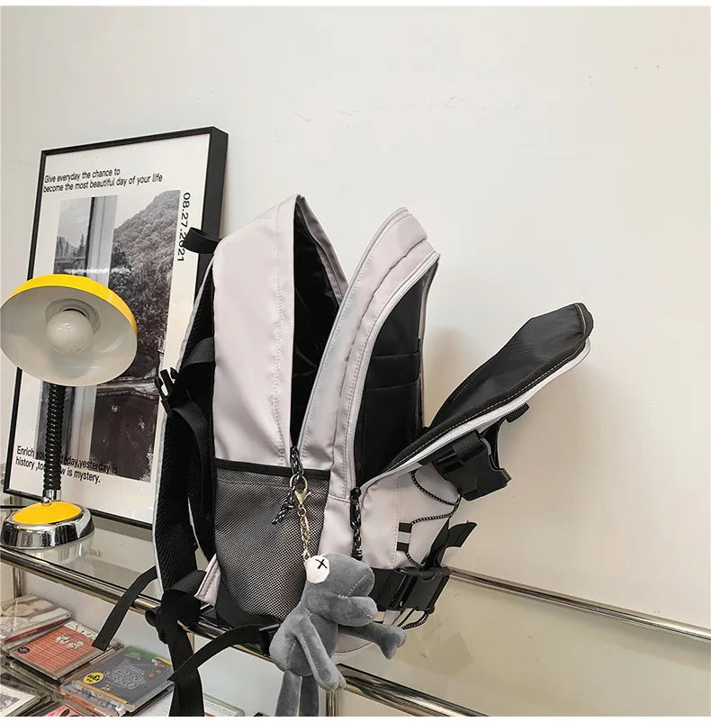 Backpack men and women cool backpack leisure junior high school students backpack personality skateboard