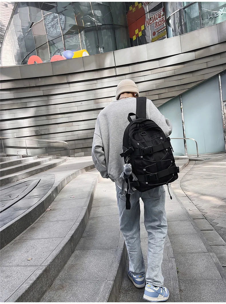 Backpack men and women cool backpack leisure junior high school students backpack personality skateboard
