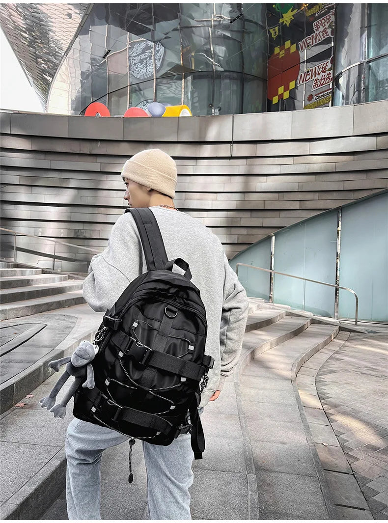 Backpack men and women cool backpack leisure junior high school students backpack personality skateboard