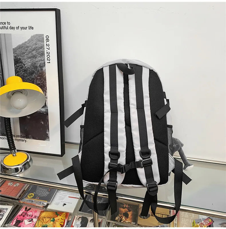 Backpack men and women cool backpack leisure junior high school students backpack personality skateboard